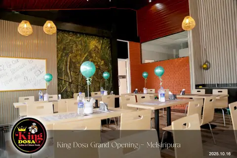 King Dosa dining area with mural wall